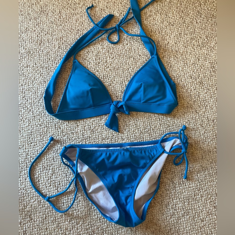 Small blue Victoria’s Secret bikini. Lightly worn. But good as new.